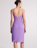Back view of the silk cadel slip in purple worn on a model.