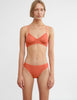 front view on model of woman in orange bra and panty